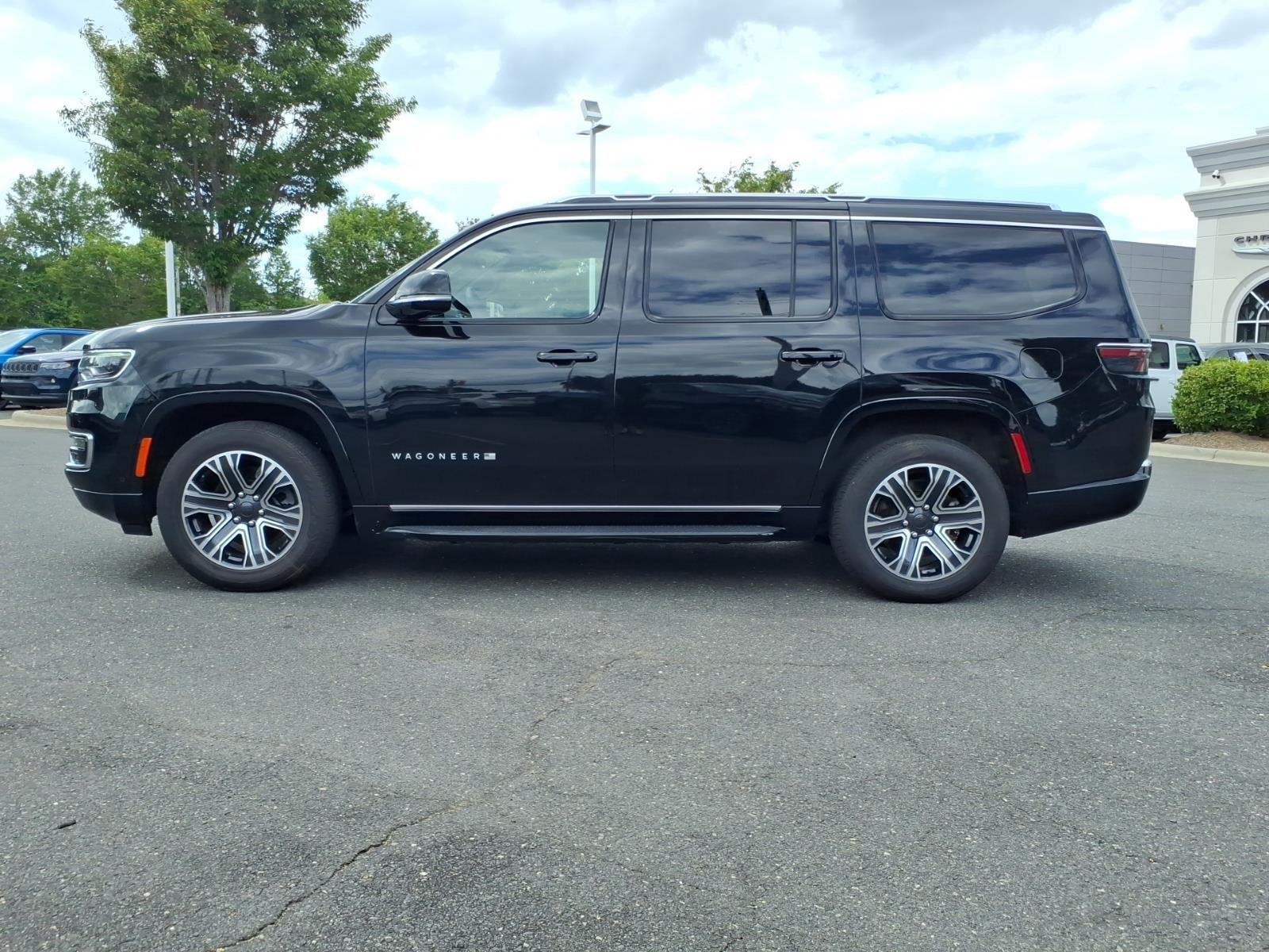 Used 2024 Diamond Black Crystal Pearlcoat Jeep Series II image 3