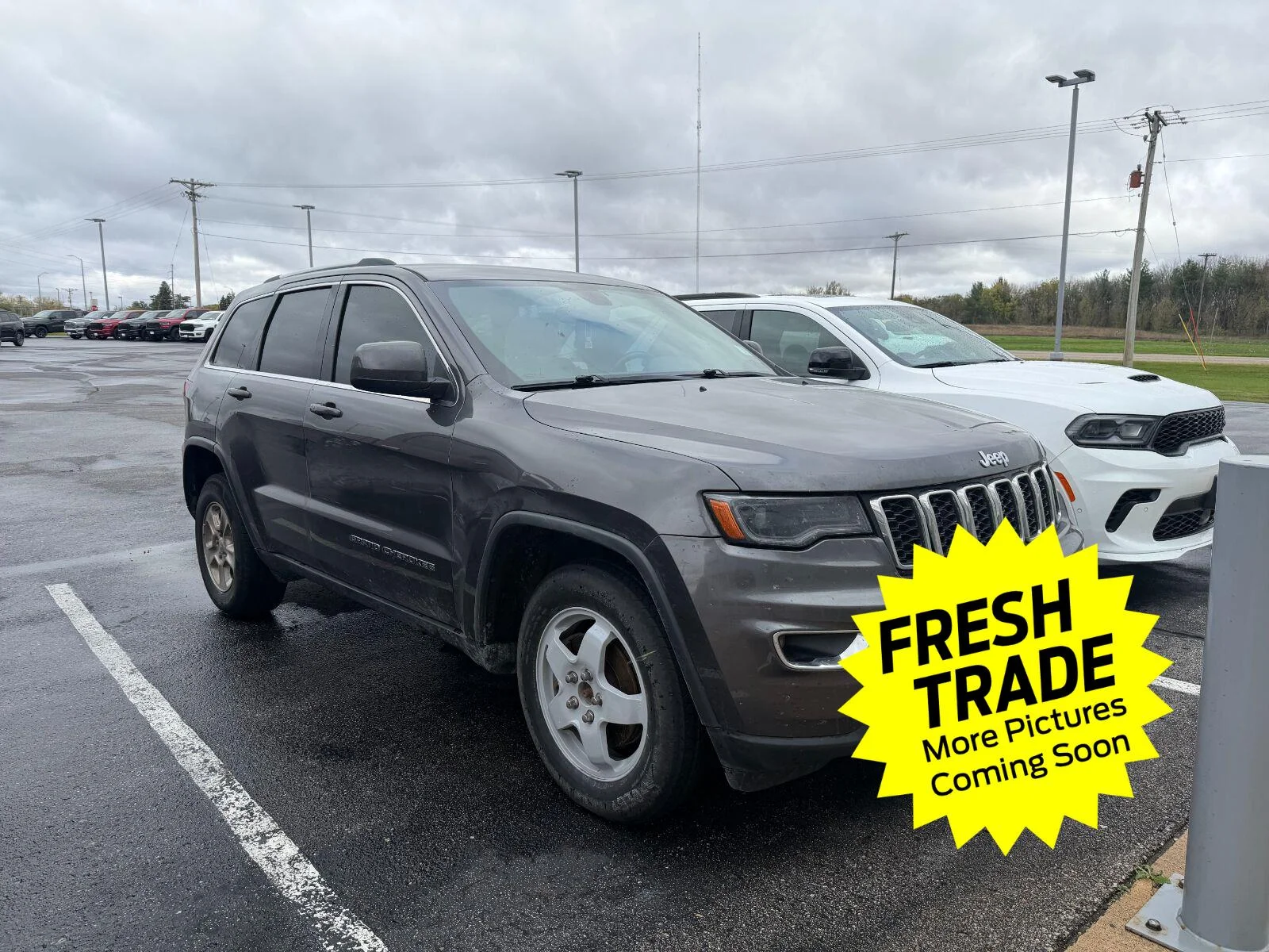 Used 2017 Jeep Grand Cherokee Laredo E with VIN 1C4RJFAG3HC890118 for sale in Charles City, IA