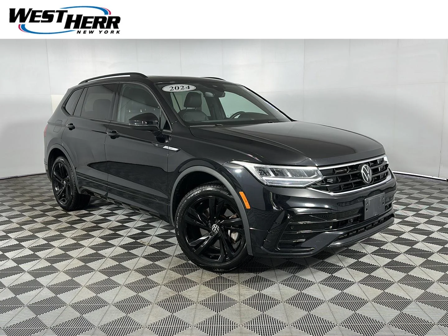 Used 2024 Deep Black Pearl Volkswagen SE R-Line Black image 1