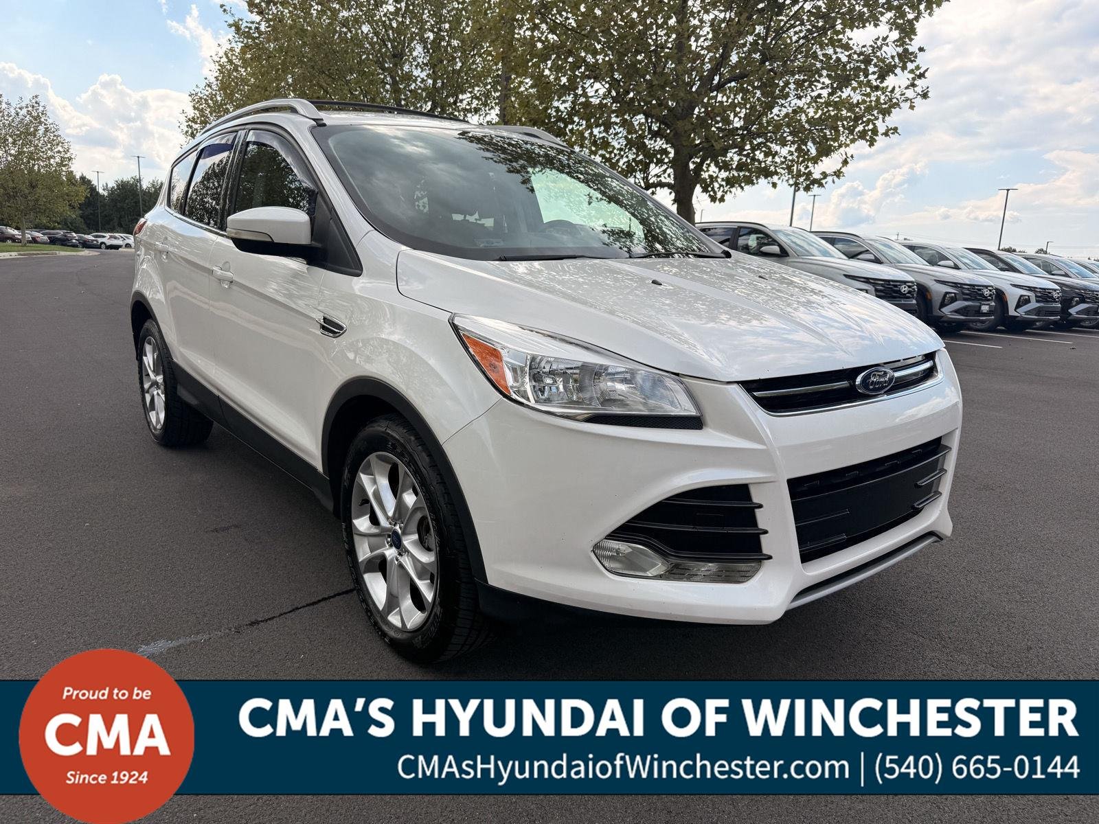 Used 2016 White Platinum Metallic Tri-Coat Ford Titanium image 1