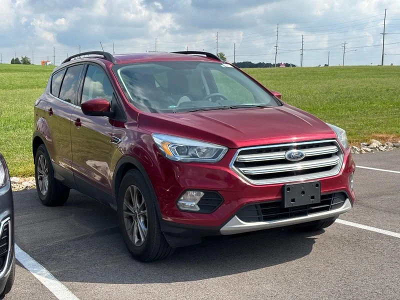 Used 2017 Ruby Red Metallic Tinted Clearcoat Ford SE image 3