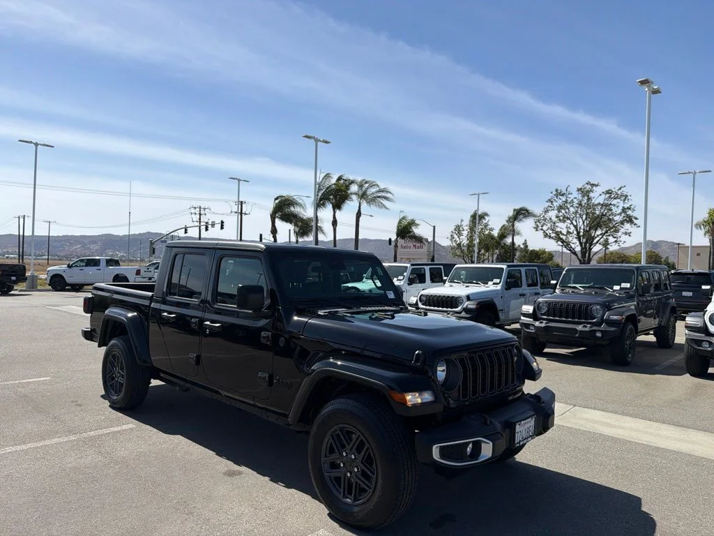 Used 2024 Black Jeep Sport image 1