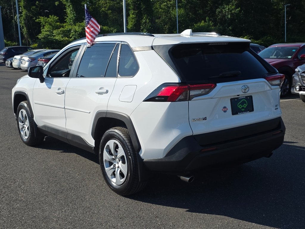 Used 2021 Super White Toyota LE image 11