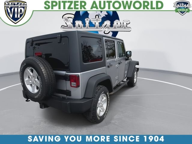 Used 2015 Silver Jeep Unlimited Sport image 9