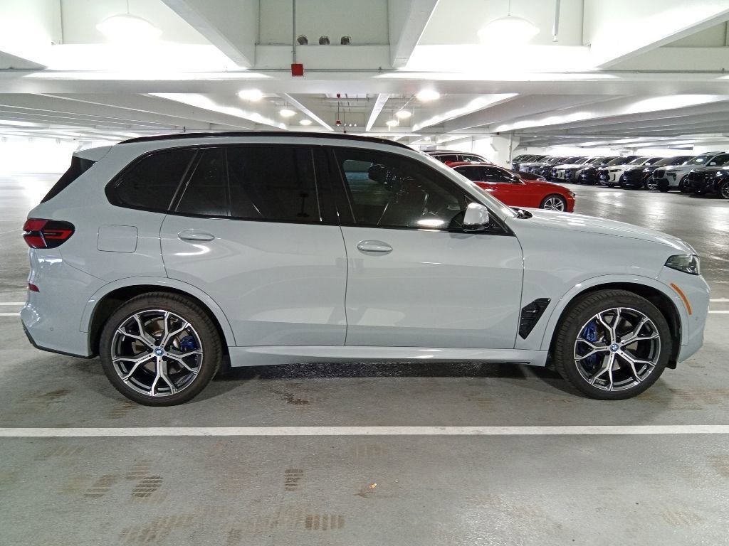 Used 2024 Brooklyn Grey Metallic BMW xDrive50e image 4