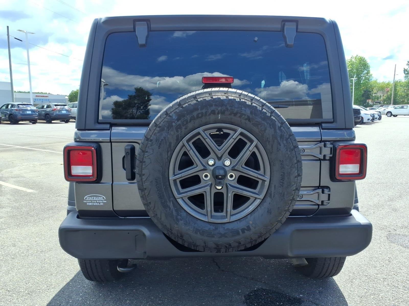 Used 2024 Granite Crystal Metallic Clearcoat Jeep Sport S image 17