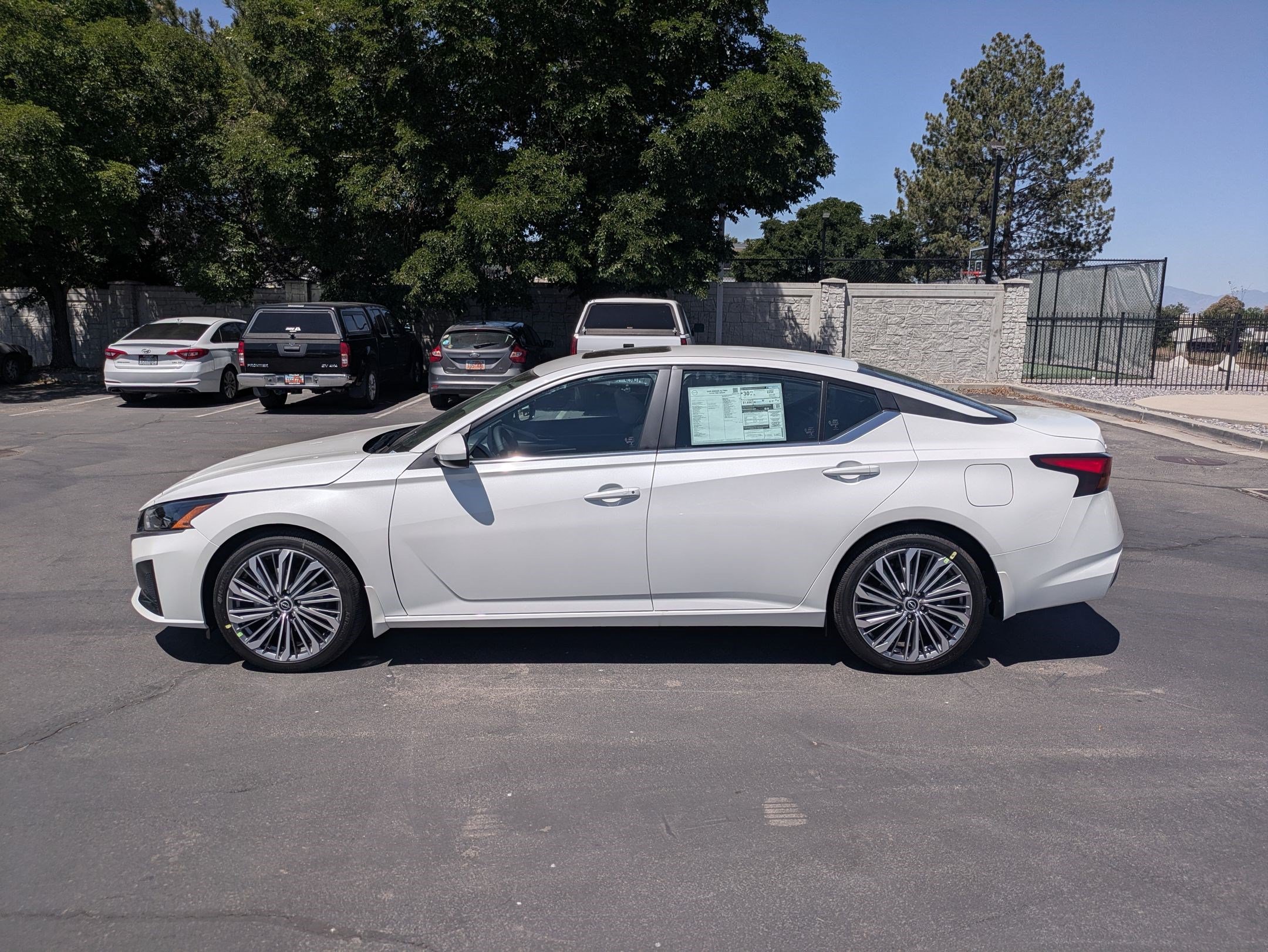 New 2026 Pearl White Tricoat Nissan SV image 7