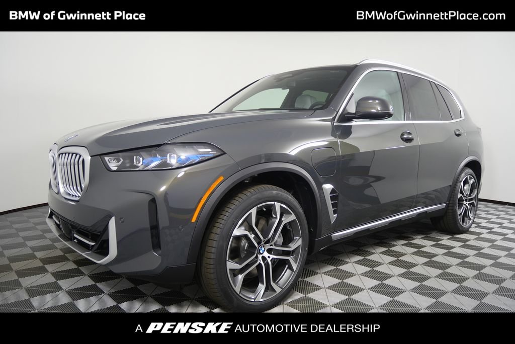 Used 2026 Dravit Grey Metallic BMW xDrive50e image 1