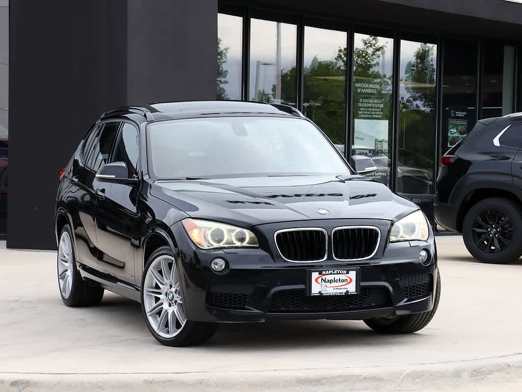 Used 2013 BMW X1 35i with VIN WBAVM5C59DVV90199 for sale in Naperville, IL
