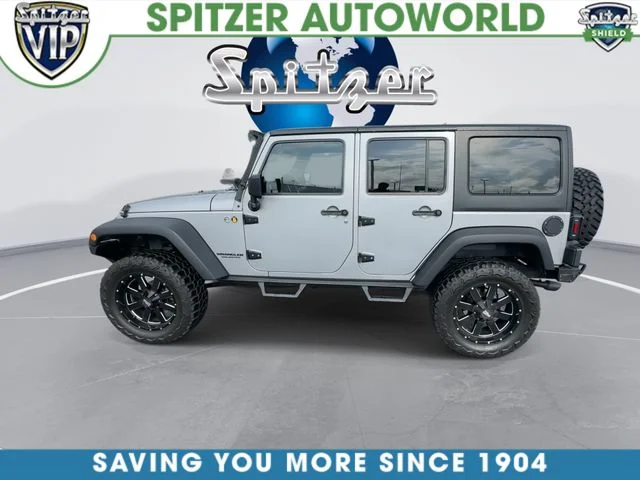Used 2015 Silver Jeep Unlimited Sport image 6