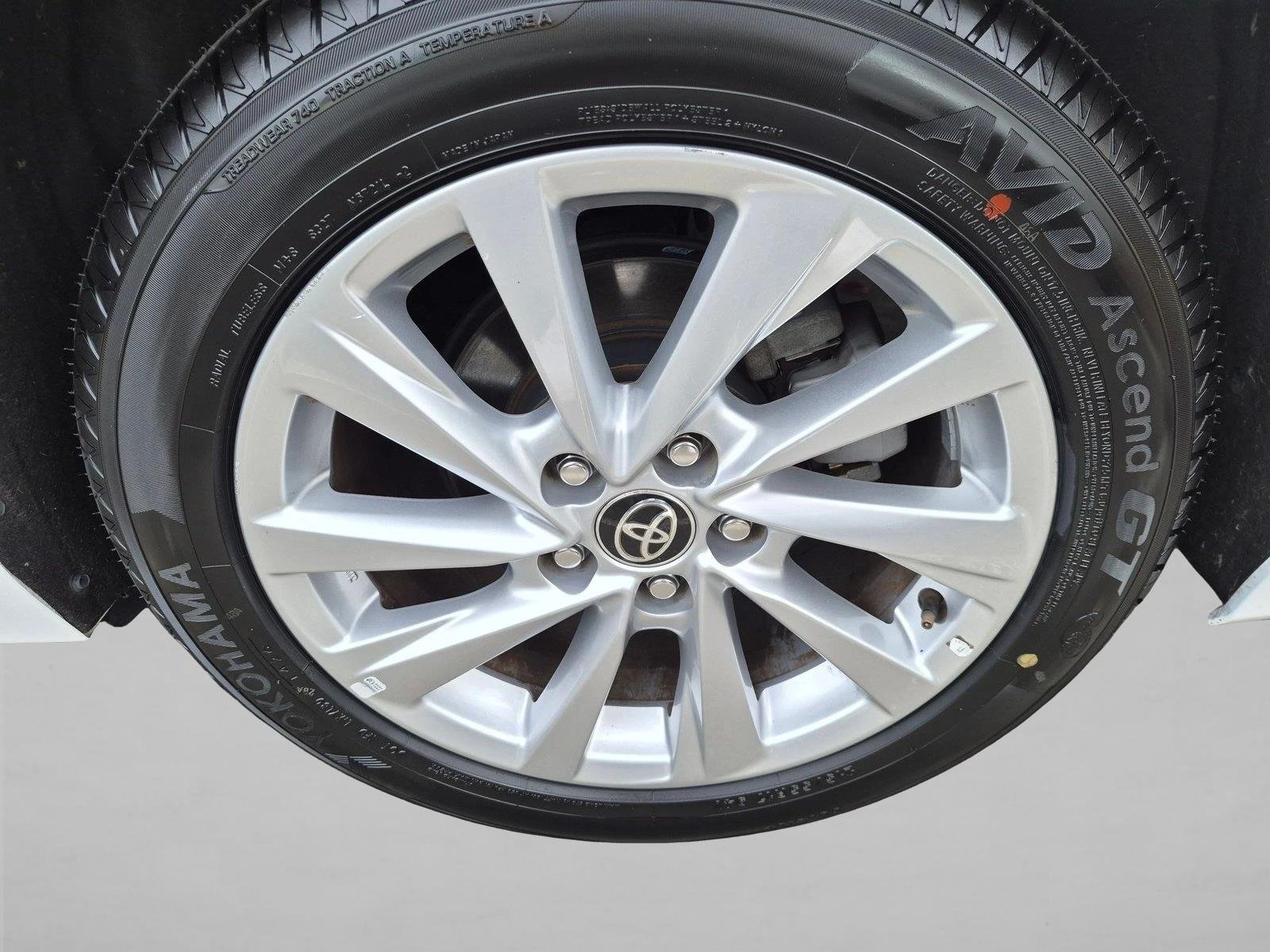 Used 2021 Super White Toyota LE image 21