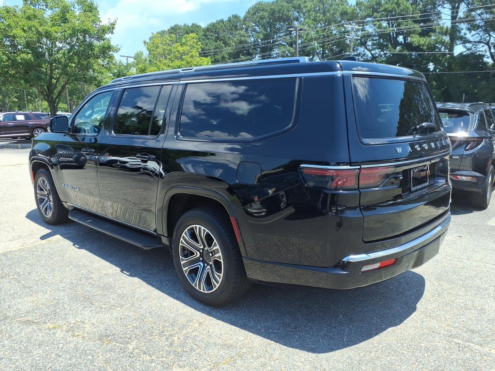 Used 2024 Diamond Black Crystal Pearlcoat Jeep Series II image 7