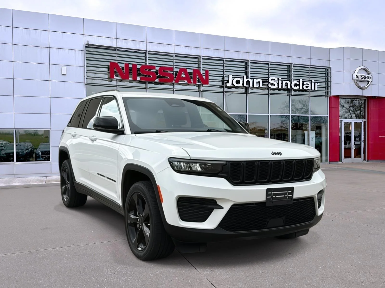 Used 2023 Bright White Clearcoat Jeep Altitude image 1