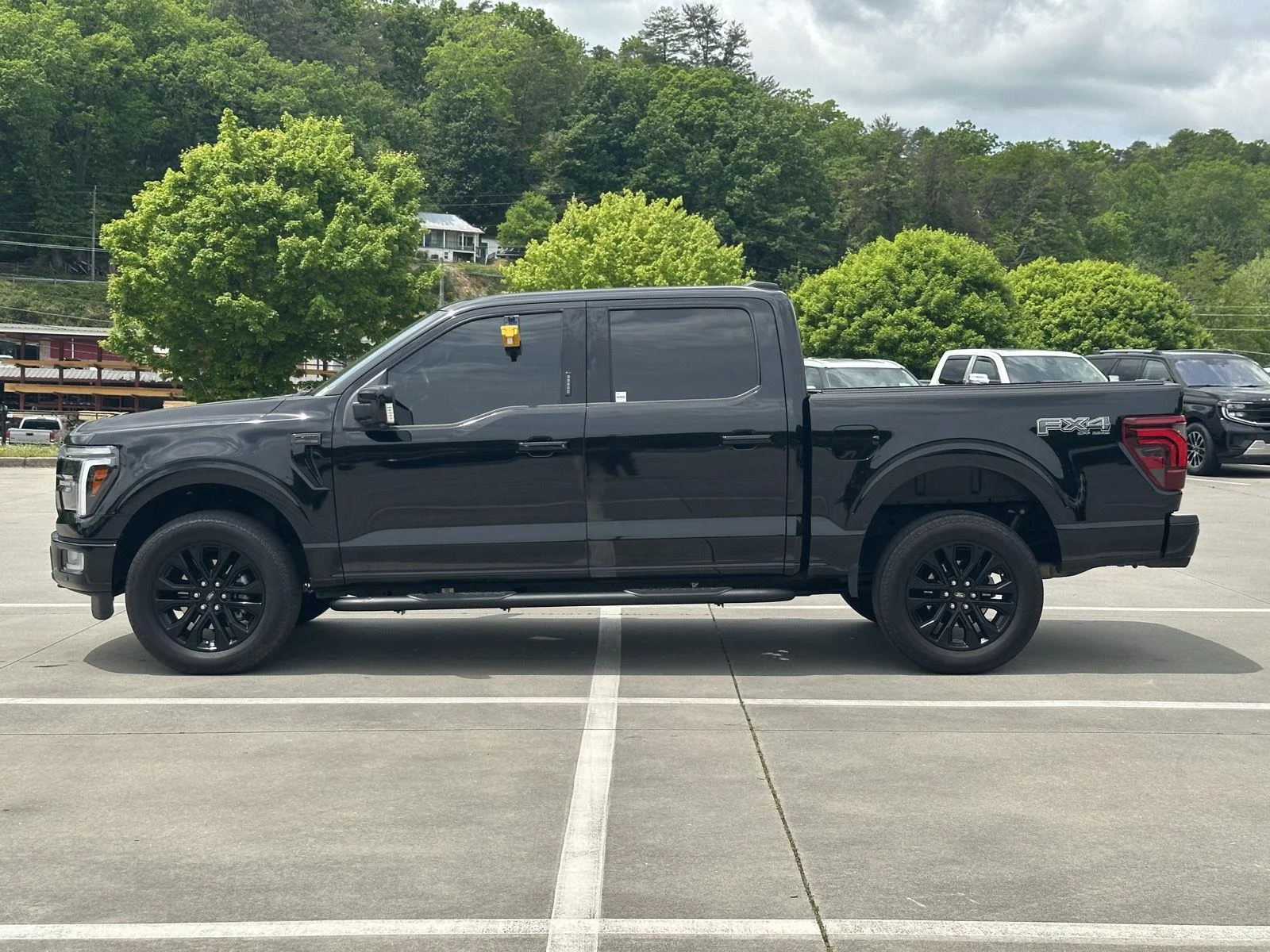 Used 2024 Agate Black Metallic Ford LARIAT image 5