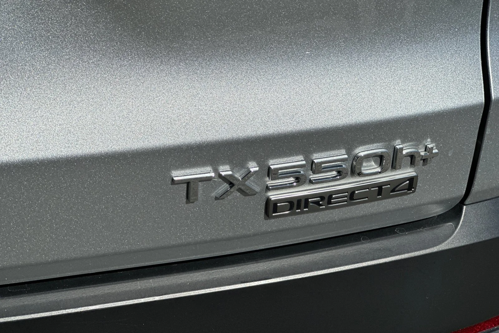 Used 2024 Silver Lexus 550h+ Luxury image 16