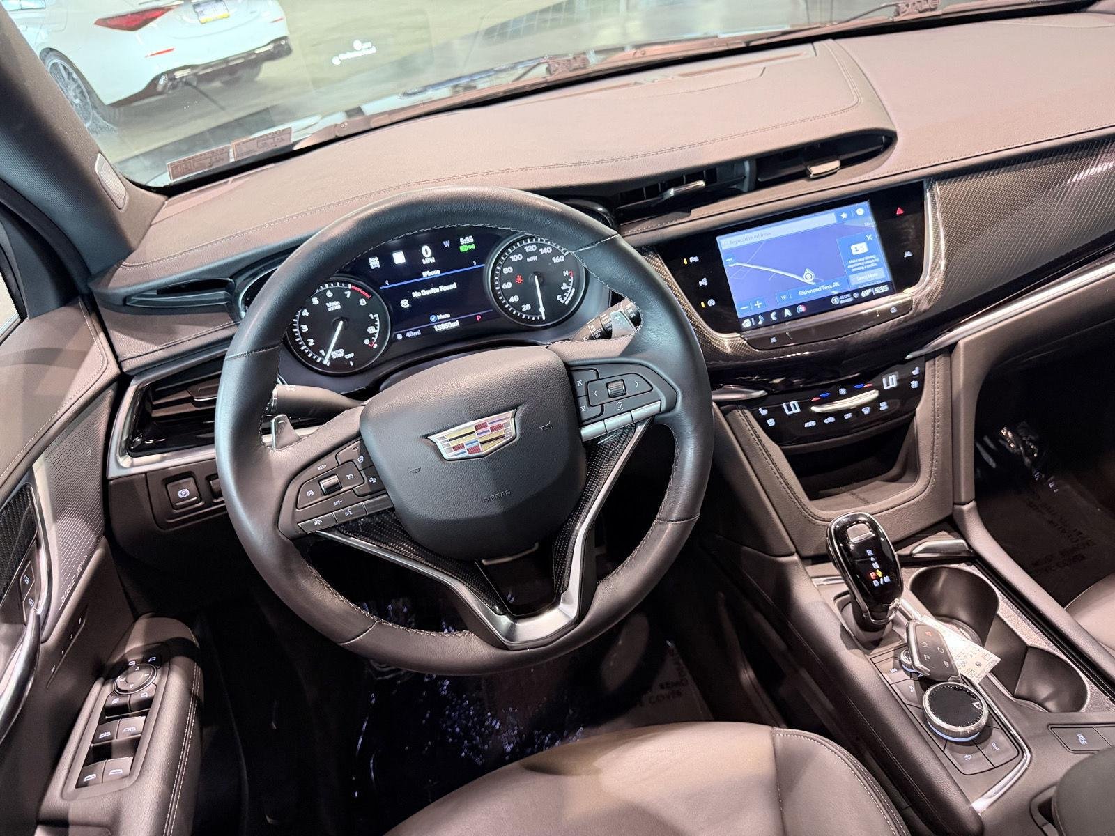 Used 2024 Stellar Black Metallic Cadillac Sport image 39