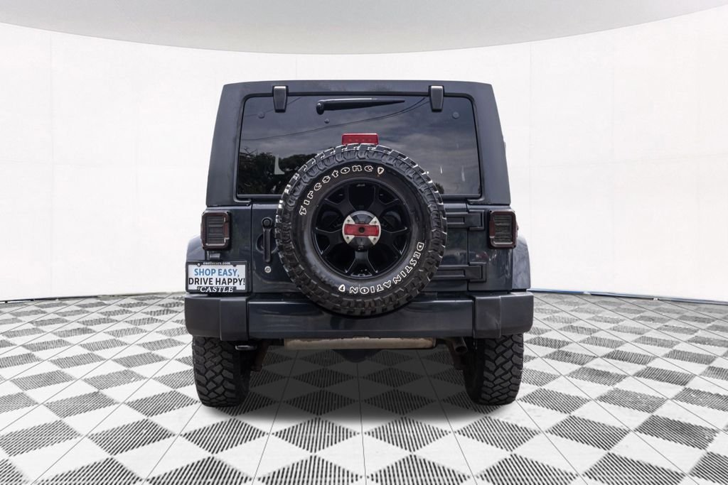 Used 2017 Black Jeep Unlimited Sahara image 9