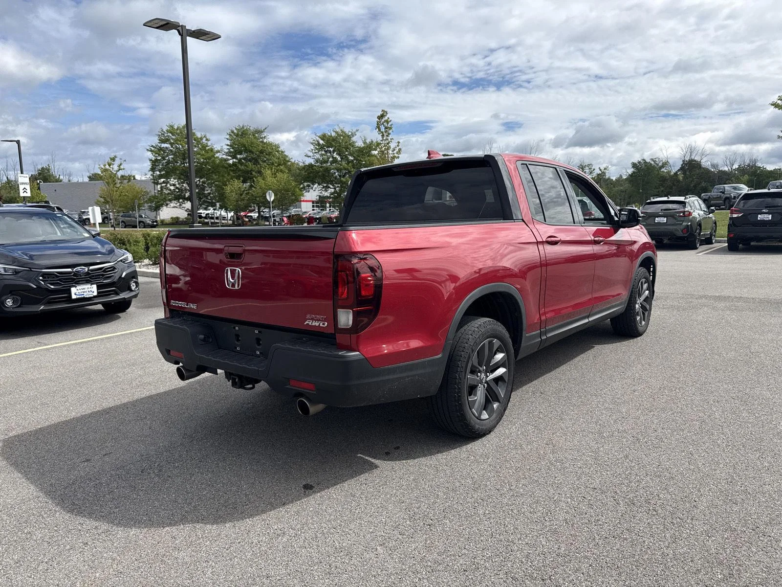 Used 2023 Radiant Red Metallic II Honda Sport image 4