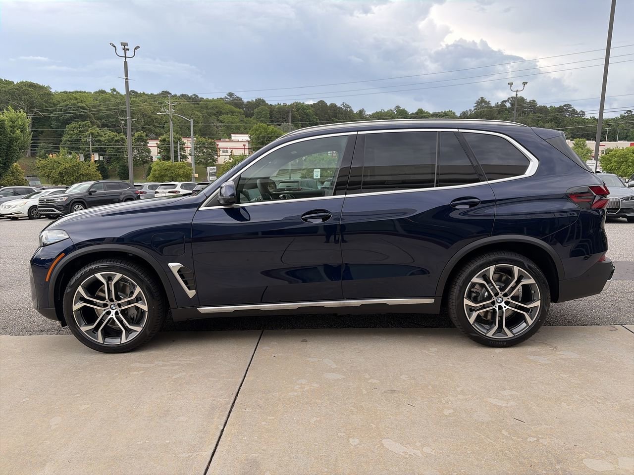 New 2026 Tanzanite Blue II Metallic BMW xDrive50e image 5
