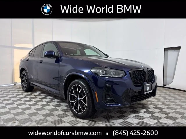 Used 2024 Tanzanite Blue II Metallic BMW xDrive30i image 1