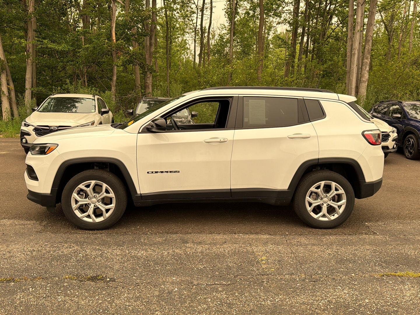Used 2024 Bright White Clearcoat Jeep Latitude image 11