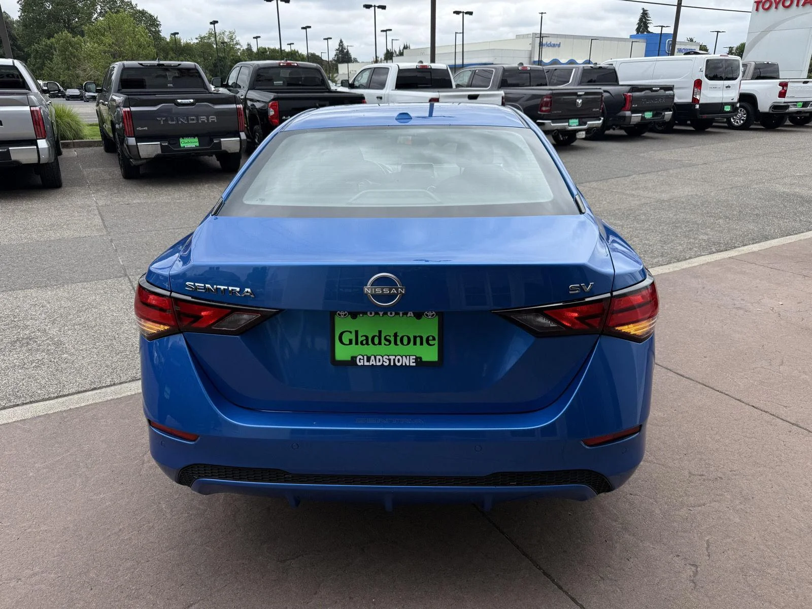 Used 2024 Electric Blue Metallic Nissan SV image 5