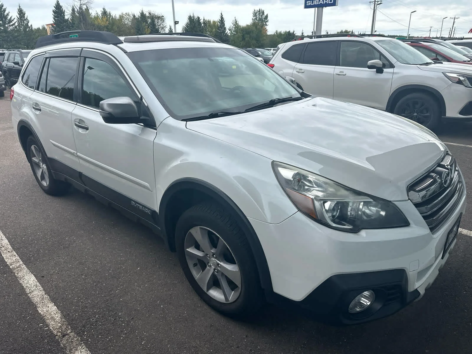 Used 2013 Subaru Outback Limited with VIN 4S4BRBSC1D3218868 for sale in Hermantown, Minnesota