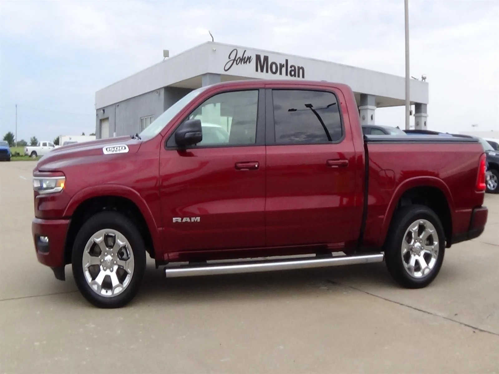 Certified Used 2025 Delmonico Red Pearl Coat (prv) RAM Big Horn image 1