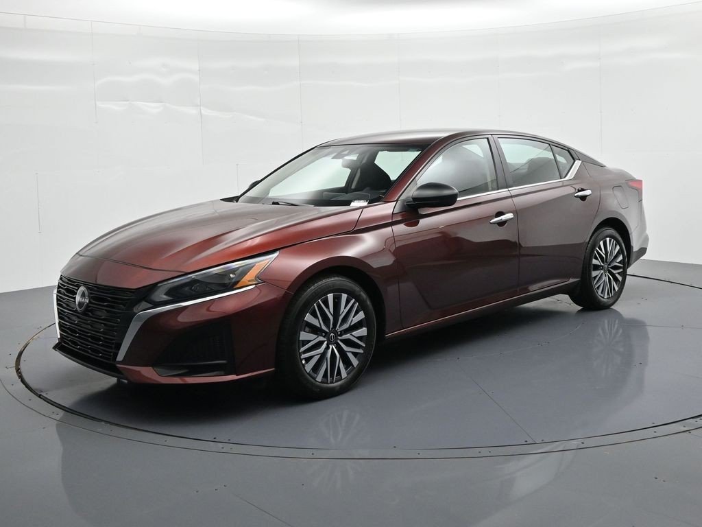 Used 2025 Garnet Pearl Nissan SV FWD image 1