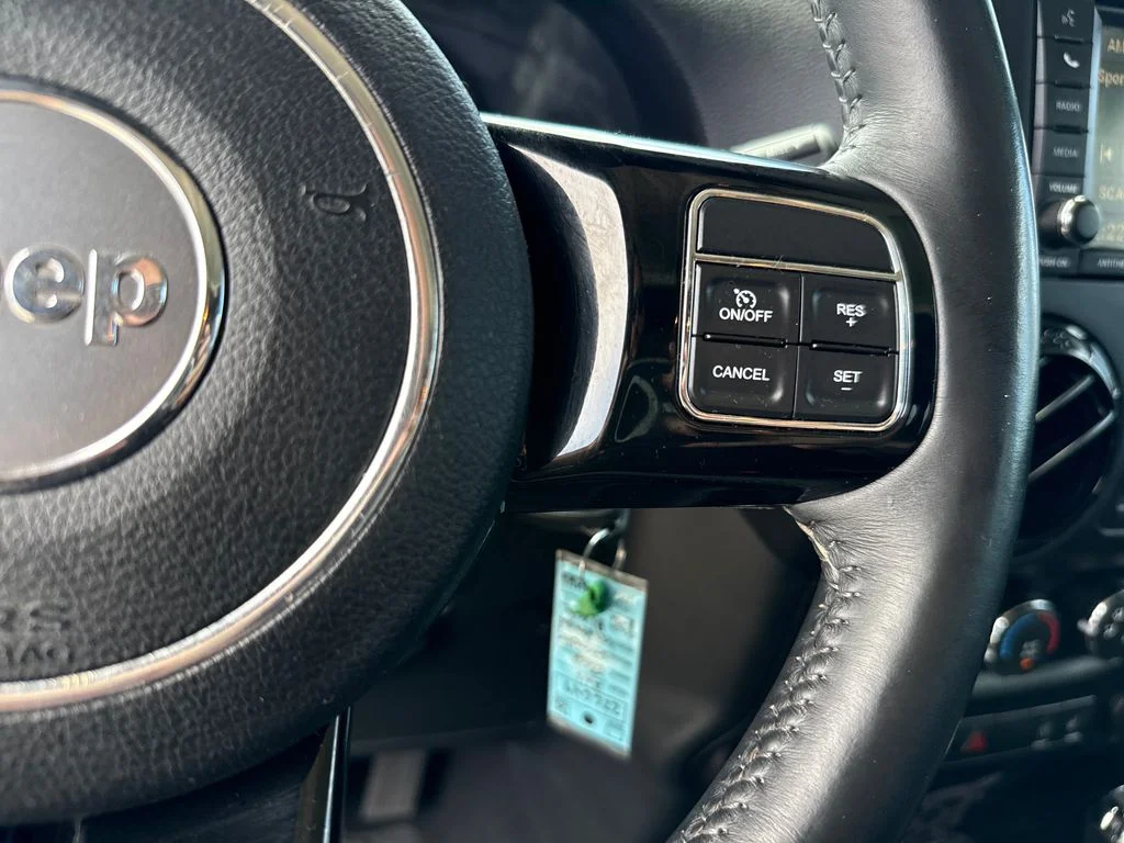 Used 2016 Black Jeep Unlimited Sahara image 14