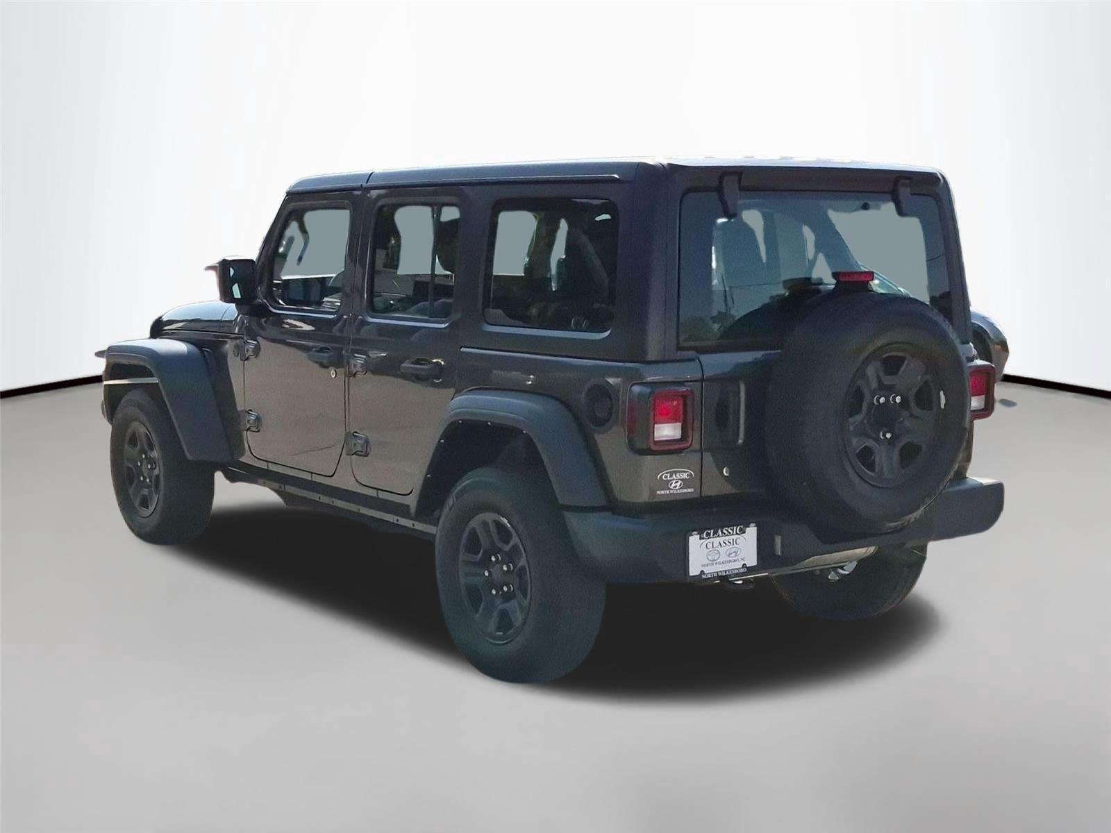 Used 2022 Granite Crystal Metallic Clearcoat Jeep Unlimited Sport image 3