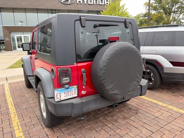 Used 2010 Red Jeep Sport image 7