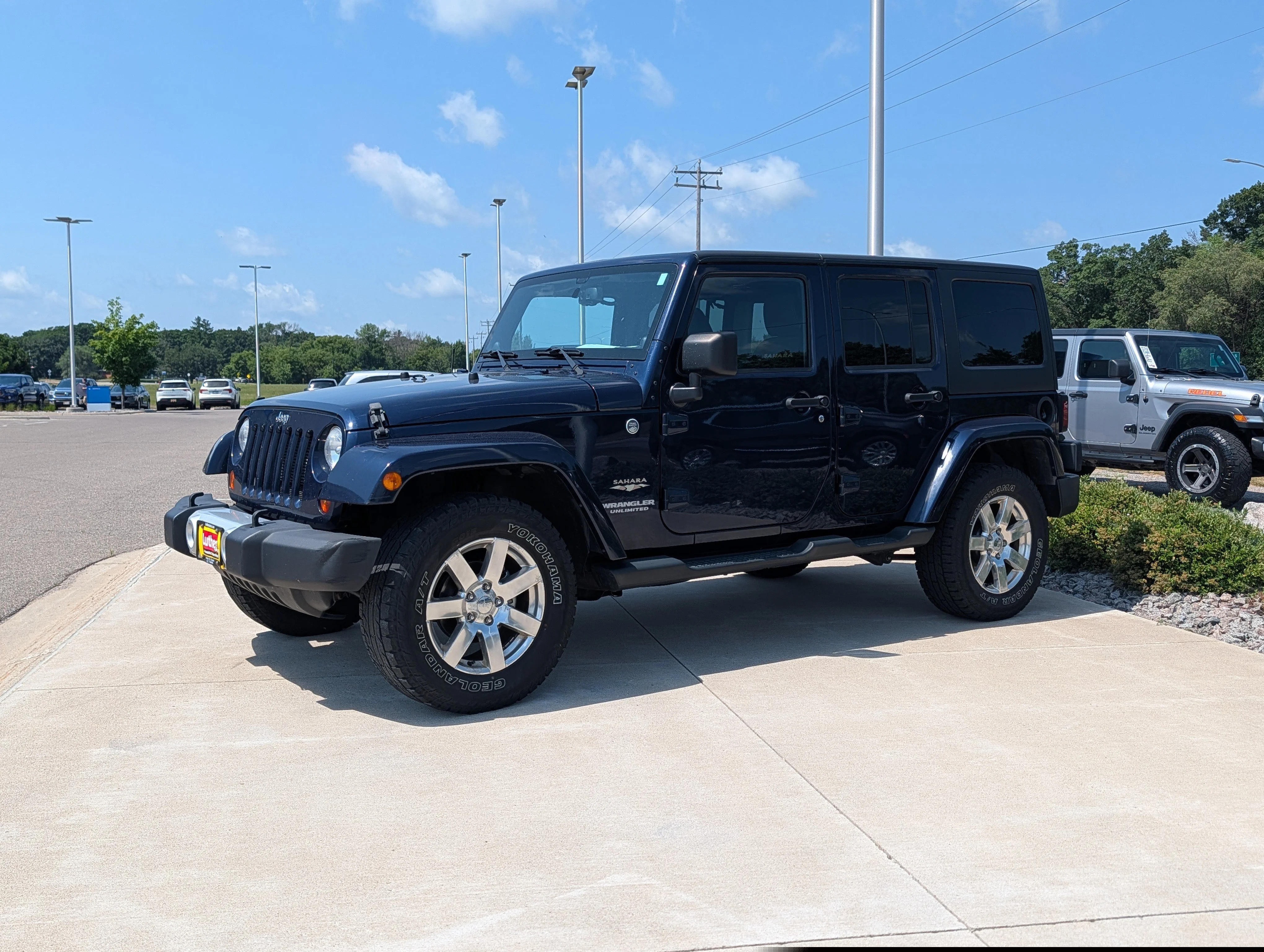 Used 2013 Jeep Wrangler Unlimited Sahara with VIN 1C4BJWEG7DL568622 for sale in Waite Park, MN