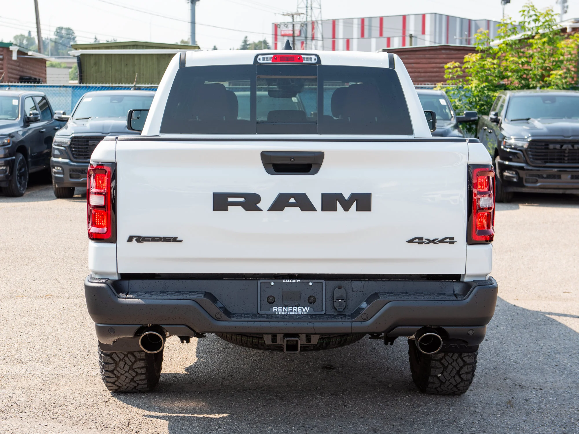New 2026 White RAM Rebel* Crew Cab 4x4, 33 Inch A/T Tires, Factory Suspension Lift, Bilstein Shocks image 6