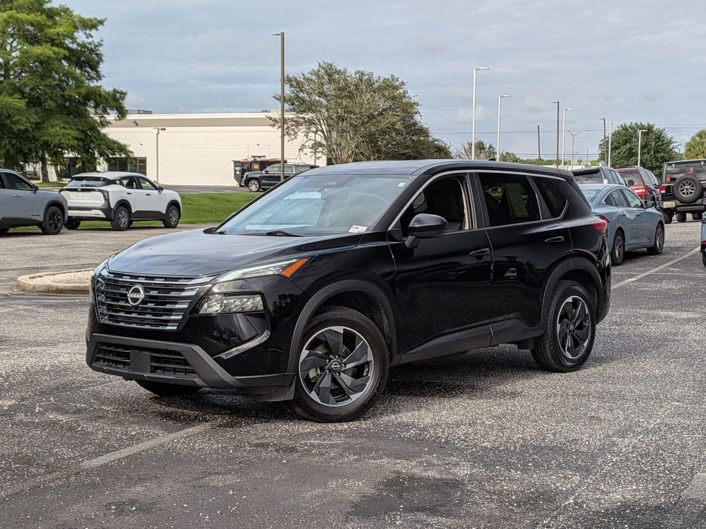 Used 2024 Black Nissan SV image 1