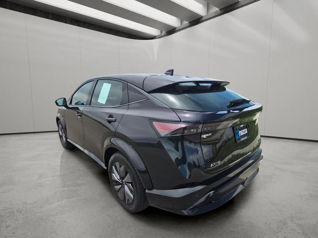 Used 2024 Northern Lights Metallic Nissan EVOLVE+ image 3