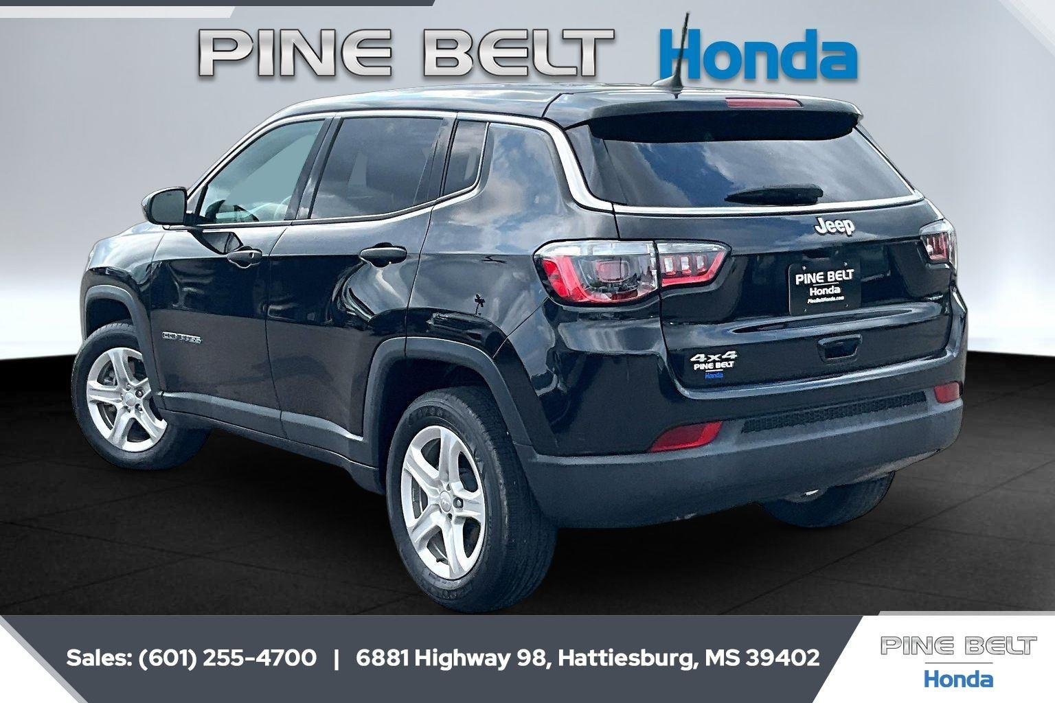 Used 2023 Diamond Black Crystal Pearlcoat Jeep Sport image 2