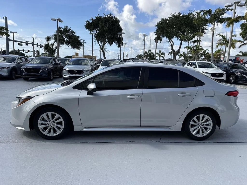 Used 2023 Classic Silver Metallic Toyota LE image 11