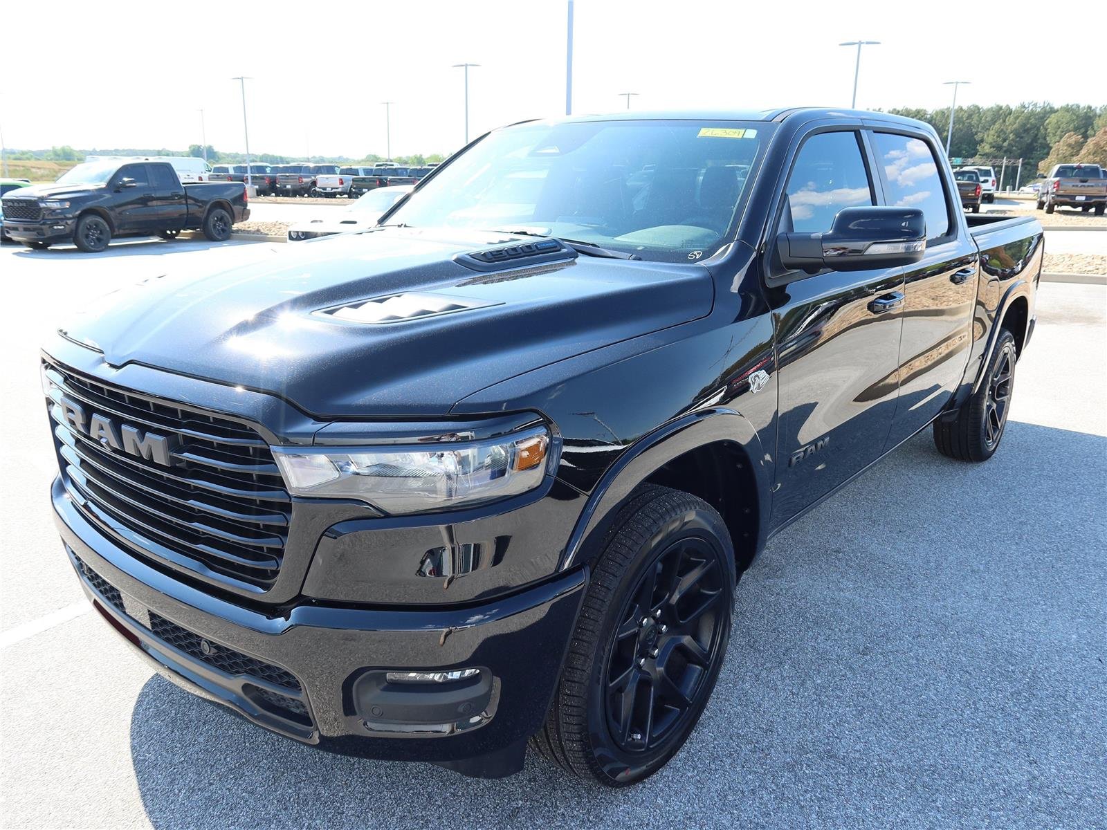 New 2026 Diamond Black Crystal Pearl-Coat Exterior Paint RAM Laramie image 3