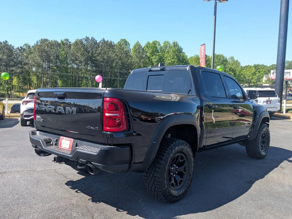 Used 2025 Diamond Black Crystal Pearlcoat Ram RHO image 5