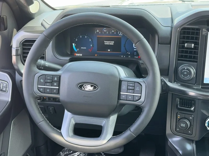 New 2026 Agate Black Metallic Ford LARIAT 4WD SuperCrew 5.5
