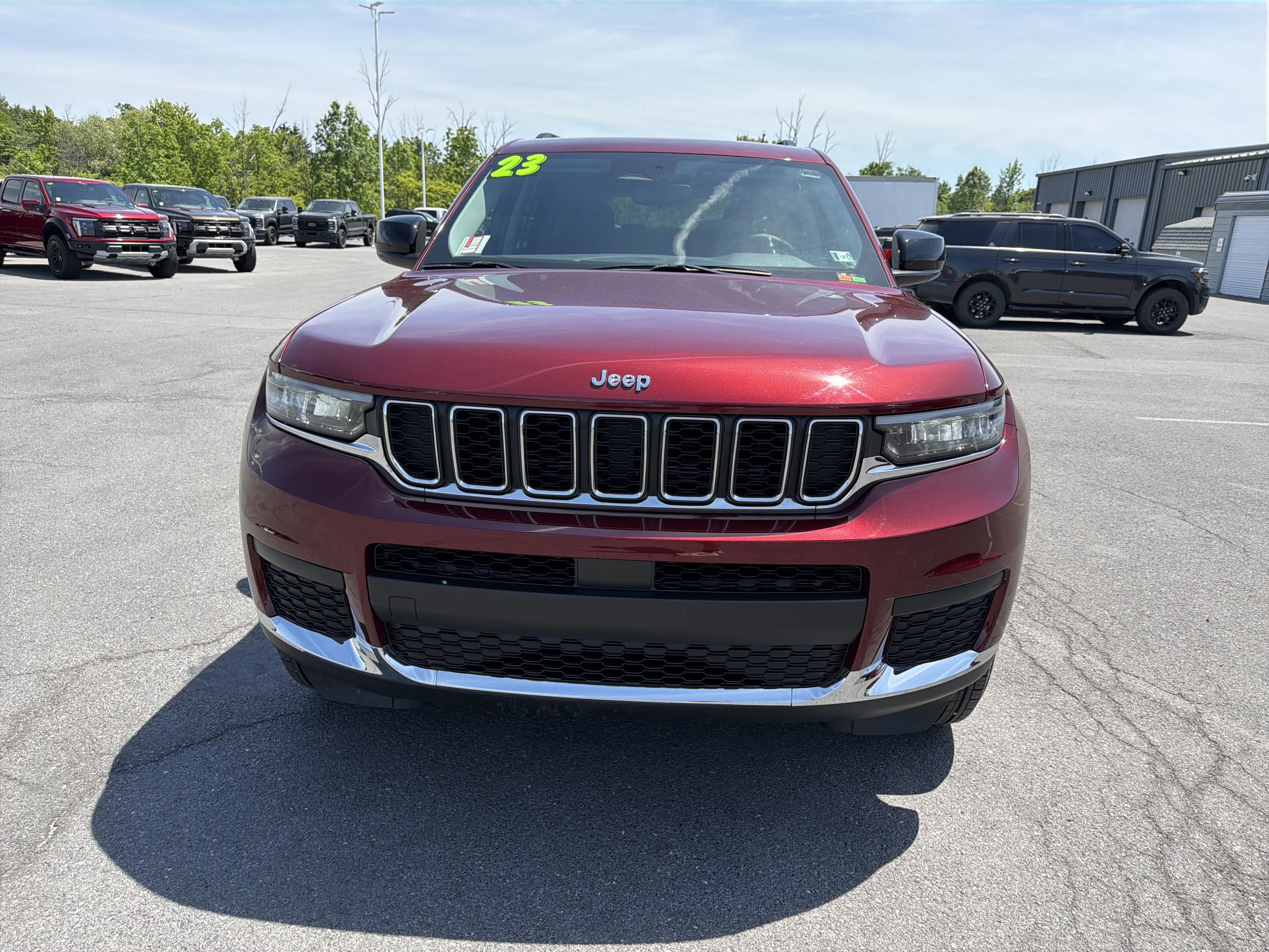 Used 2023 Velvet Red Pearlcoat Jeep Laredo image 9