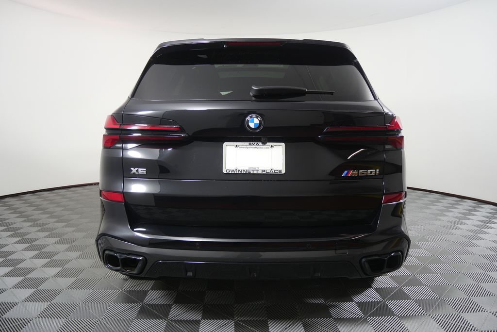 Certified Used 2026 Black Sapphire Metallic BMW M60i image 4