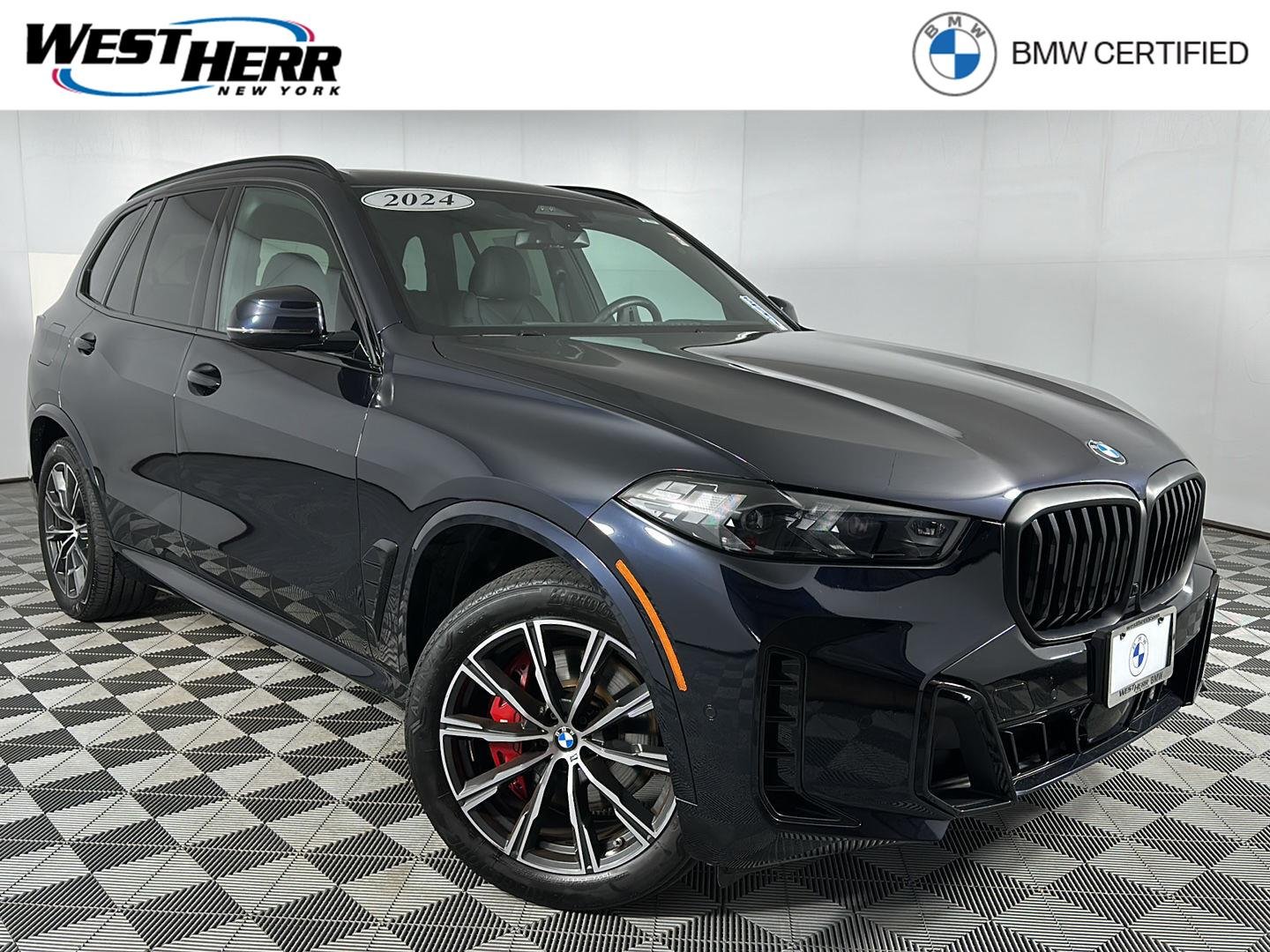 Certified Used 2024 Carbon Black Metallic BMW xDrive40i image 1