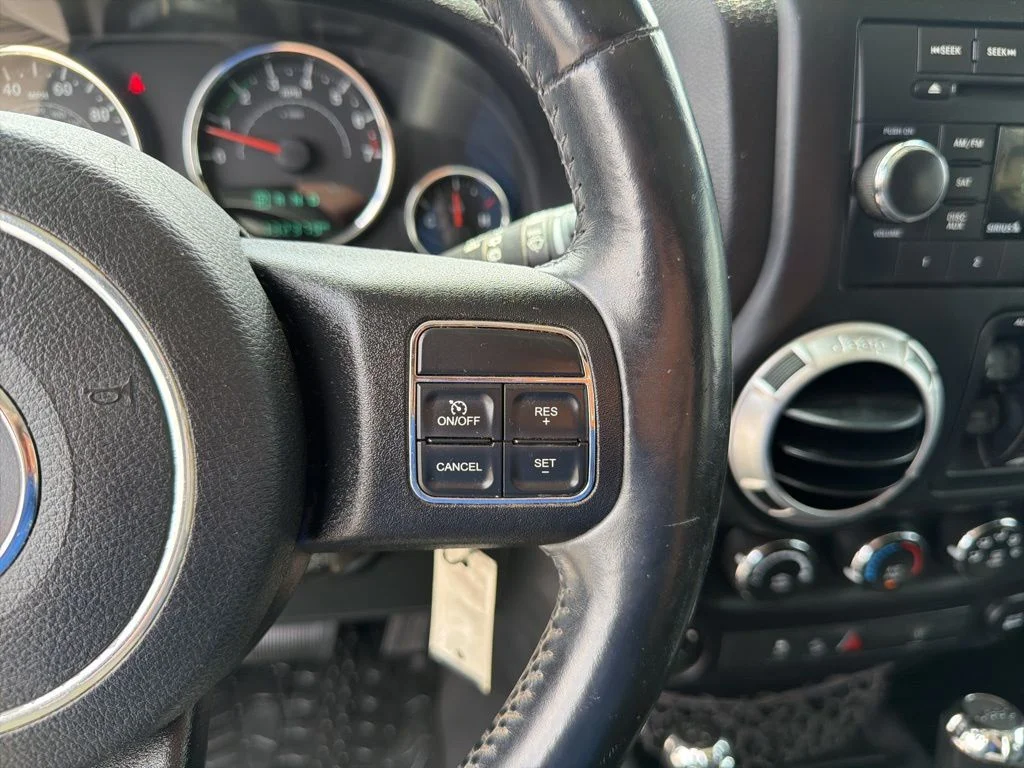 Used 2015 White Jeep Unlimited Sahara image 38