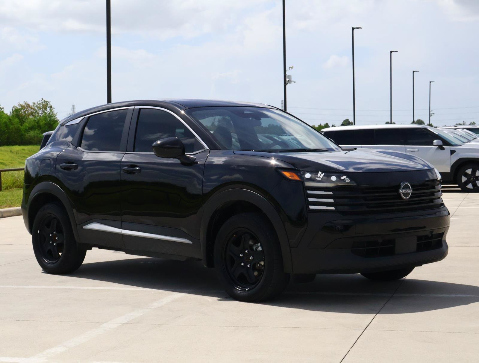 Used 2025 Super Black Nissan SV image 6