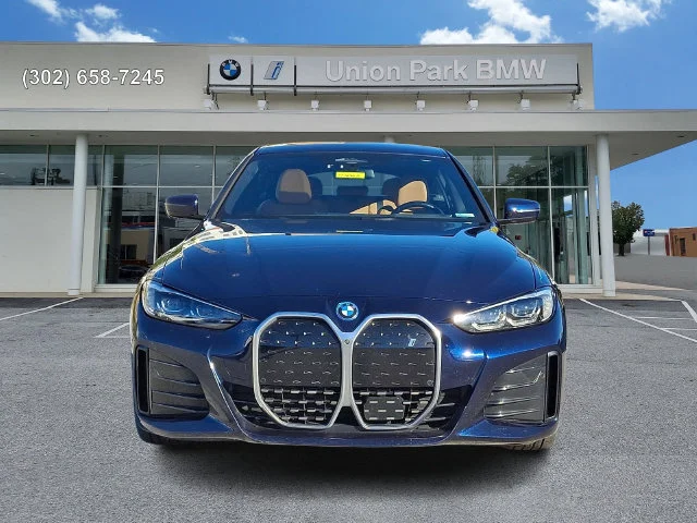 Certified Used 2022 Tanzanite Blue II Metallic BMW eDrive40 image 2