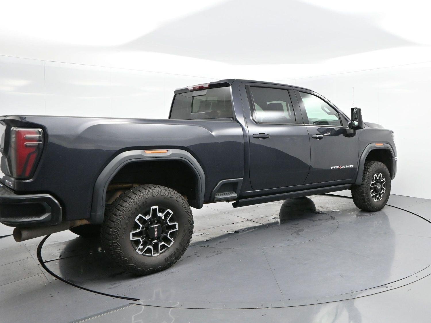 Used 2024 Titanium Rush Metallic GMC AT4X image 7