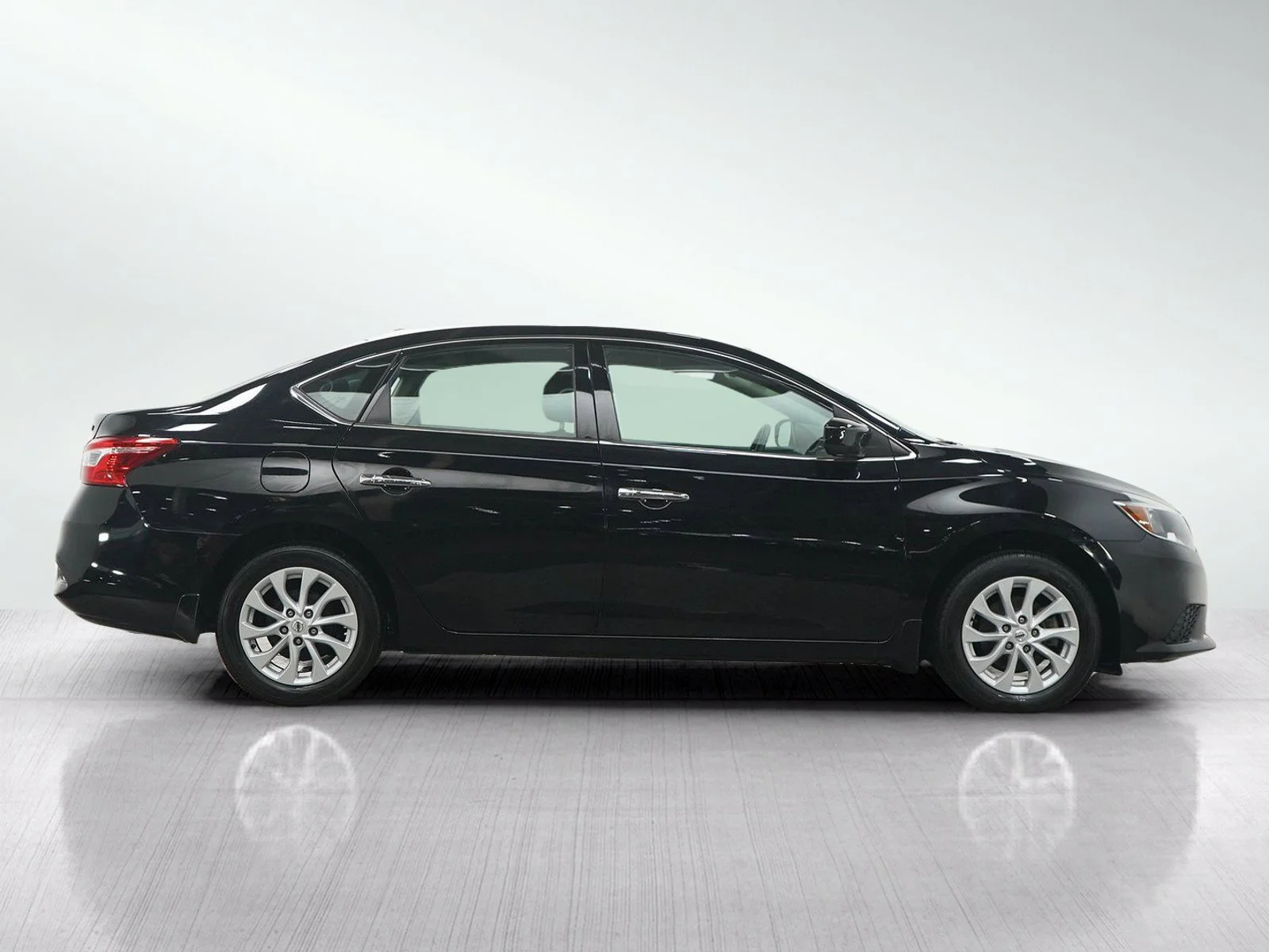 Used 2019 Super Black Nissan SV image 6