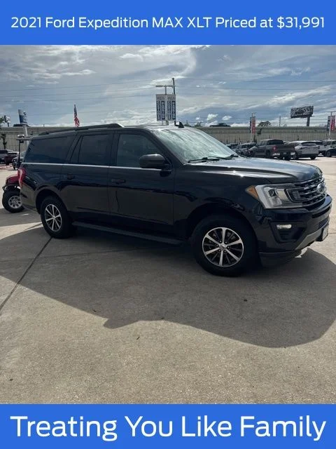 Used 2021 Agate Black Metallic Ford XLT image 1